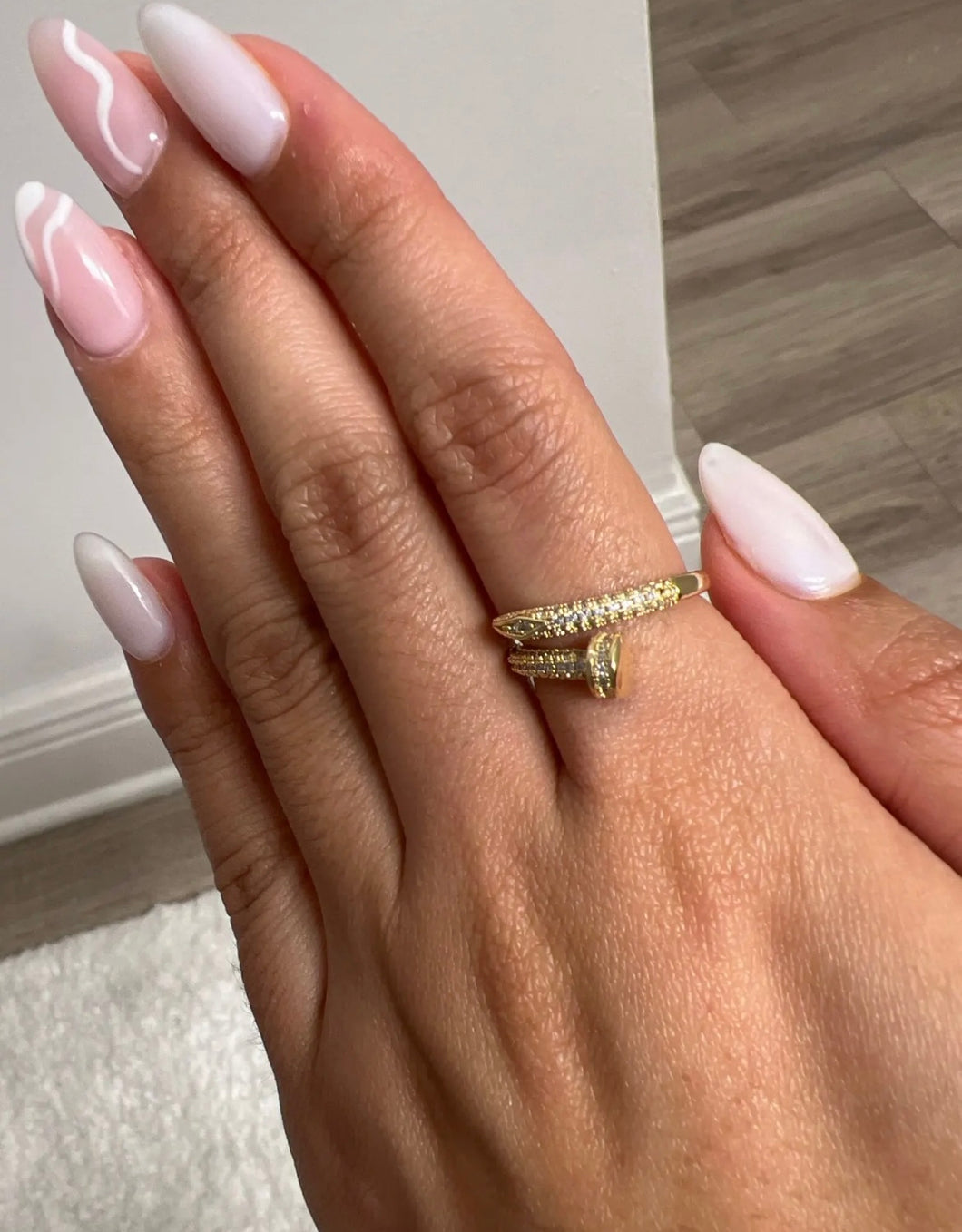 Iced out nail ring